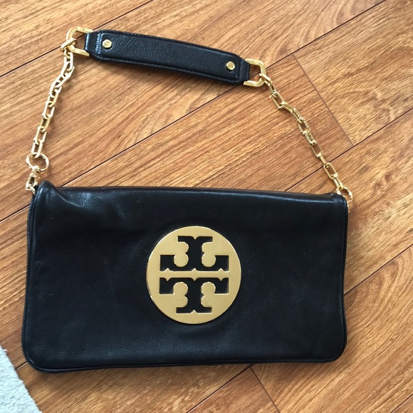Tory Burch Handbags - Tory Burch black and gold clutch